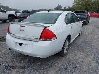 2013 Chevrolet Impala LTZ with VIN 2G1WC5E39D1202260, listed as a IAAI auction lot 41908155 with 210,193 mi miles and . Bid and sale history available at DreamBid. Image 4.