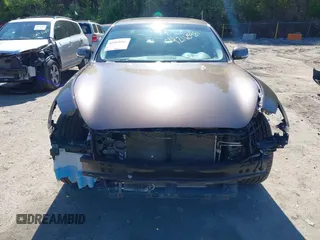 2015 Infiniti Q70 z VIN JN1BY1AR1FM560845, wystawiony jako IAAI lot #42165981 z przebiegiem 75 767 mil mil oraz . Historia ofert i sprzedaży dostępna na DreamBid. Obrazek 6.