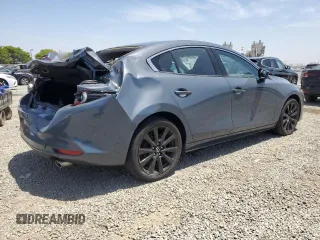 2022 Mazda 3 Carbon Edition with VIN JM1BPACL6N1507664, listed as a Copart auction lot 57847125 with 34,258 mi miles and Salvage title. Bid and sale history available at DreamBid. Image 3.