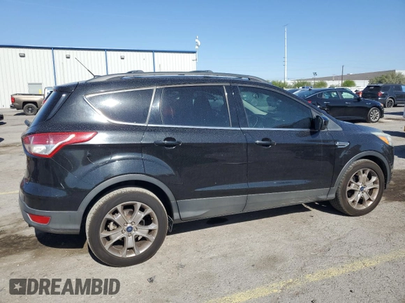 2013 Ford Escape SE with VIN 1FMCU0GX8DUA38056, listed as a Copart auction lot 57617885 with 128,467 mi miles and Salvage title. Bid and sale history available at DreamBid. Image 3.