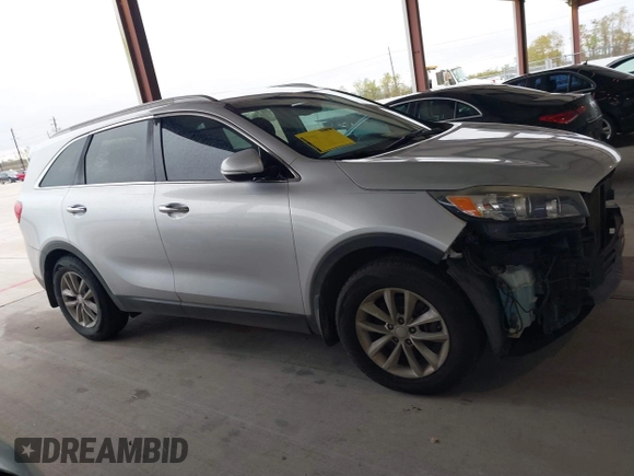 2018 Kia Sorento LX with VIN 5XYPG4A55JG360565, listed as a IAAI auction lot 41031059 with 138,963 mi miles and . Bid and sale history available at DreamBid. Image 13.
