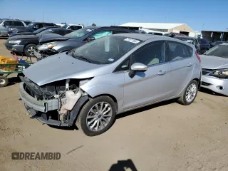 2017 Ford Fiesta Titanium with VIN 3FADP4FJ5HM123974, listed as a Copart auction lot 71977364 with 90,906 mi miles and Salvage Title. Bid and sale history available at DreamBid. Image 1.