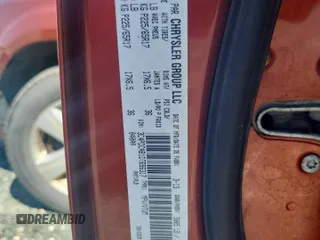 2013 Dodge Journey American Value z VIN 3C4PDCAB1DT656317, wystawiony jako Copart lot #58525885 z przebiegiem 210 834 mil mil oraz Szkoda całkowita • Salvage title. Historia ofert i sprzedaży dostępna na DreamBid. Obrazek 13.