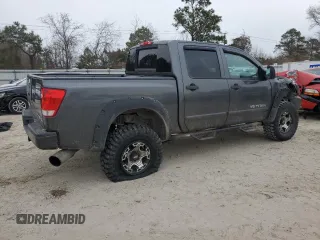 2010 Nissan Titan LE with VIN 1N6BA0ECXAN310425, listed as a Copart auction lot 88897755 with 132,467 mi miles and Salvage Title. Bid and sale history available at carsss.com. Image 3.