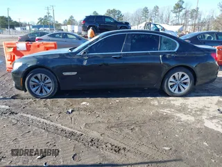 2011 BMW 7 Series 740i with VIN WBAKA4C58BC392020, listed as a IAAI auction lot 41314751 with 116,553 mi miles. Bid and sale history available at carsss.com. Image 14.