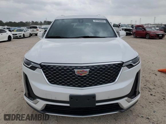 2024 Cadillac XT6 FWD Luxury with VIN 1GYKPAR47RZ720446, listed as a Copart auction lot 51762695 with 10,728 mi miles and Salvage Title. Bid and sale history available at carsss.com. Image 5.