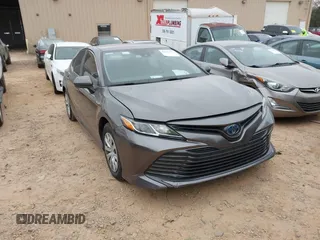 2019 Toyota Camry Hybrid LE z VIN 4T1B31HK4KU007116, wystawiony jako IAAI lot #41833774 z przebiegiem 182 780 mil mil oraz . Historia ofert i sprzedaży dostępna na DreamBid. Obrazek 1.