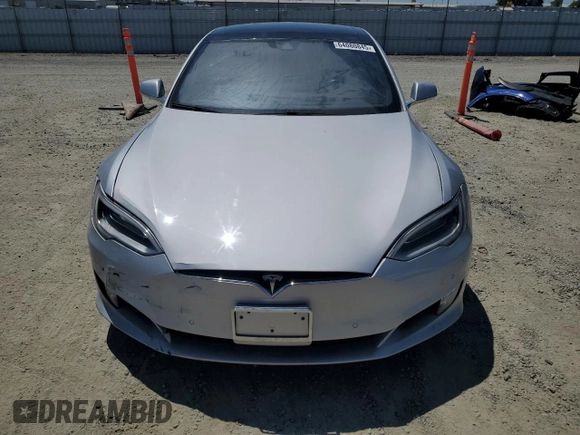 2016 Tesla Model S 90D с VIN 5YJSA1E23GF144496, выставлен на аукционе Copart как лот 64080845 с пробегом 34 847 миль миль и Списание • Salvage title. История ставок и продаж доступна на DreamBid. Изображение 5.
