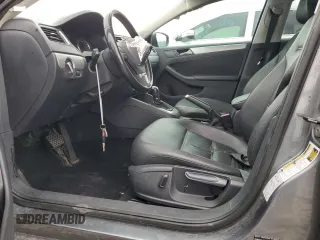 2014 Volkswagen Jetta SE z VIN 3VWD07AJ4EM239120, wystawiony jako Copart lot #57304045 z przebiegiem 183 748 mil mil oraz Szkoda całkowita • Salvage title. Historia ofert i sprzedaży dostępna na DreamBid. Obrazek 7.