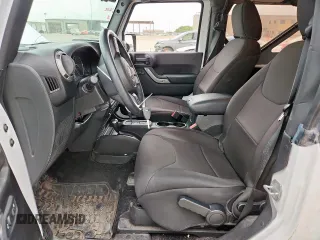 2016 Jeep Wrangler Black Bear with VIN 1C4AJWAG0GL104173, listed as a Copart auction lot 63565415 with 52,922 mi miles and Salvage title. Bid and sale history available at DreamBid. Image 7.