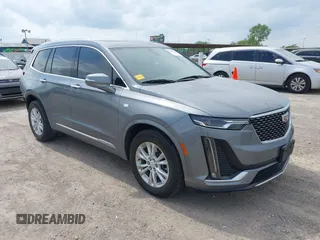 2022 Cadillac XT6 Luxury with VIN 1GYKPAR43NZ120470, listed as a IAAI auction lot 42153712 with 28,863 mi miles and . Bid and sale history available at DreamBid. Image 1.