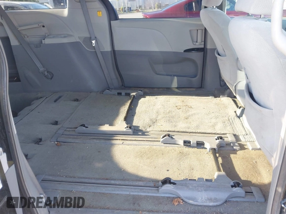 2012 Toyota Sienna with VIN 5TDKA3DC4CS013590, listed as a IAAI auction lot 41423163 with 109,845 mi miles and . Bid and sale history available at DreamBid. Image 8.