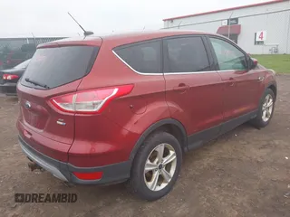 2014 Ford Escape SE with VIN 1FMCU9G97EUC50213, listed as a IAAI auction lot 42130075 with 235,406 mi miles. Bid and sale history available at carsss.com. Image 4.