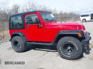2002 Jeep Wrangler X with VIN 1J4FA39S02P739211, listed as a IAAI auction lot 41665910 with 144,118 mi miles. Bid and sale history available at carsss.com. Image 13.