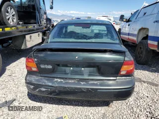 2000 Saturn SL with VIN 1G8ZH5285YZ240565, listed as a Copart auction lot 66567153 with 202,109 mi miles and Salvage title. Bid and sale history available at DreamBid. Image 6.