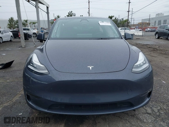 2023 Tesla Model Y Long Range with VIN 7SAYGDEE3PA152683, listed as a IAAI auction lot 41798988 with 14,063 mi miles and . Bid and sale history available at carsss.com. Image 12.