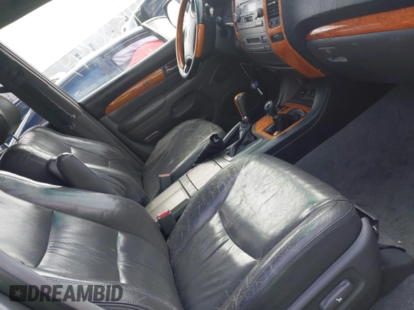 2003 Lexus GX with VIN JTJBT20X830006106, listed as a IAAI auction lot 41520749 with 264,413 mi miles. Bid and sale history available at carsss.com. Image 5.