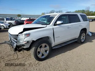 2016 Chevrolet Tahoe LTZ z VIN 1GNSKCKC6GR161798, wystawiony jako Copart lot #55016995 z przebiegiem 142 985 mil mil oraz Tytuł czysty. Historia ofert i sprzedaży dostępna na DreamBid. Obrazek 1.