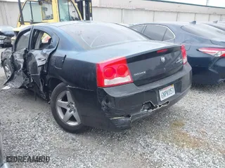 2010 Dodge Charger SXT with VIN 2B3CA3CV2AH307929, listed as a IAAI auction lot 41924632 with 173,948 mi miles. Bid and sale history available at carsss.com. Image 3.