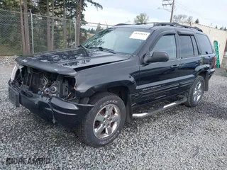 2004 Jeep Grand Cherokee Limited with VIN 1J8GW58N04C186548, listed as a IAAI auction lot 41949015 with 244,505 mi miles. Bid and sale history available at carsss.com. Image 18.