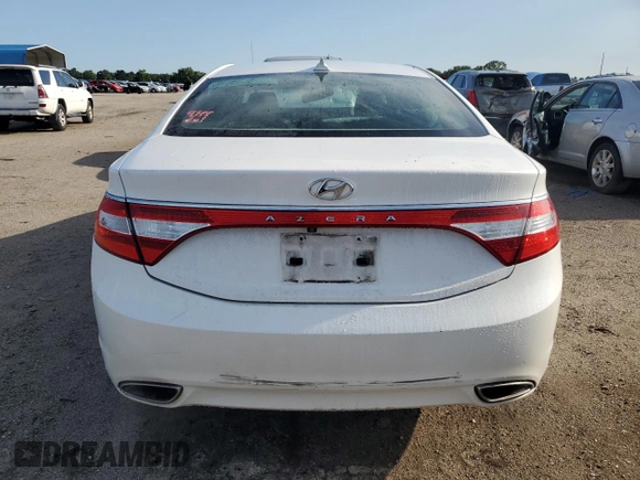 2014 Hyundai Azera z VIN KMHFG4JG6EA342493, wystawiony jako Copart lot #61897745 z przebiegiem 120 519 mil mil oraz Szkoda całkowita • Salvage title. Historia ofert i sprzedaży dostępna na DreamBid. Obrazek 6.