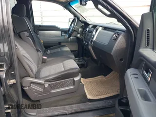 2012 Ford F-150 XL with VIN 1FTEW1CM5CFB80098, listed as a IAAI auction lot 42098438 with 216,694 mi miles. Bid and sale history available at carsss.com. Image 5.