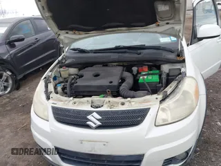 2008 Suzuki SX4 with VIN JS2YB417185102170, listed as a IAAI auction lot 42005896 with 131,810 mi miles. Bid and sale history available at carsss.com. Image 10.