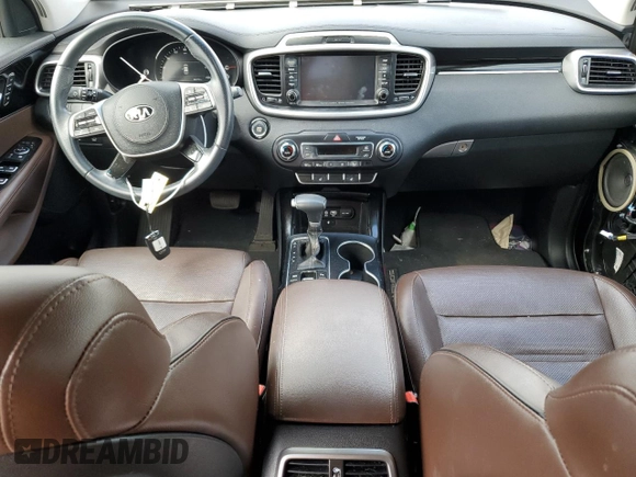 2020 Kia Sorento SX z VIN 5XYPKDA51LG703213, wystawiony jako Copart lot #70505674 z przebiegiem 48 270 mil mil oraz Szkoda całkowita • Salvage title. Historia ofert i sprzedaży dostępna na DreamBid. Obrazek 8.