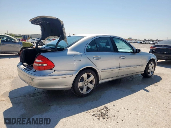 2005 Mercedes-Benz E 5.0L with VIN WDBUF70J95A718132, listed as a Copart auction lot 51620185 with 249,876 mi miles and Salvage Title. Bid and sale history available at carsss.com. Image 3.