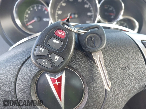 2009 Pontiac G6 1SA z VIN 1G2ZG57B394187803, wystawiony jako IAAI lot #41100404 z przebiegiem 242 388 mil mil oraz . Historia ofert i sprzedaży dostępna na DreamBid. Obrazek 11.