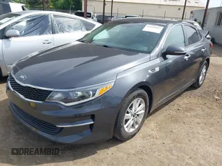 2018 Kia Optima LX z VIN KNAGT4L36J5216858, wystawiony jako IAAI lot #42149047 z przebiegiem 121 845 mil mil oraz . Historia ofert i sprzedaży dostępna na DreamBid. Obrazek 2.