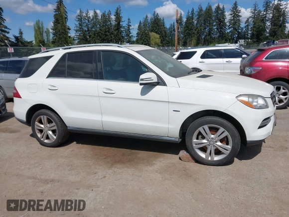 2012 Mercedes-Benz M 350 with VIN 4JGDA2EB1CA001253, listed as a IAAI auction lot 42101210 with 149,920 mi miles and . Bid and sale history available at DreamBid. Image 13.