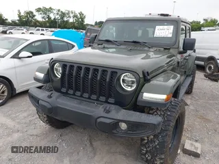 2022 Jeep Gladiator Texas Trail z VIN 1C6HJTAG1NL105124, wystawiony jako IAAI lot #42601707 z przebiegiem 52 064 mil mil oraz . Historia ofert i sprzedaży dostępna na DreamBid. Obrazek 6.
