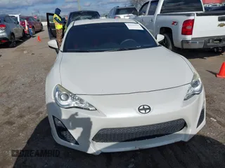 2015 Scion FR-S with VIN JF1ZNAA13F8707454, listed as a IAAI auction lot 41239233 with 130,126 mi miles. Bid and sale history available at carsss.com. Image 11.