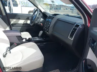 2010 Mercury Mariner Premier with VIN 4M2CN9HG4AKJ24454, listed as a IAAI auction lot 42041460 with 119,944 mi miles. Bid and sale history available at carsss.com. Image 5.