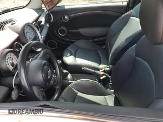 2011 MINI Hardtop S with VIN WMWSV3C59BTY23205, listed as a Copart auction lot 48672675 with 120,457 mi miles and Salvage Title. Bid and sale history available at DreamBid. Image 7.