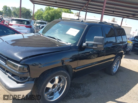 2003 Chevrolet Tahoe LS z VIN 1GNEC13T53J331221, wystawiony jako IAAI lot #42422243 z przebiegiem Nie podano mil oraz . Historia ofert i sprzedaży dostępna na DreamBid. Obrazek 15.