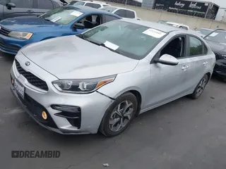2021 Kia Forte LXS with VIN 3KPF24AD5ME387610, listed as a IAAI auction lot 42133985 with 31,437 mi miles and . Bid and sale history available at carsss.com. Image 2.