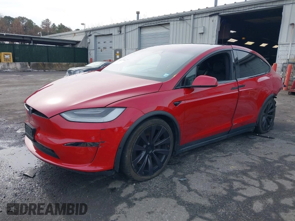 2022 Tesla Model X Plaid with VIN 7SAXCBE60NF330246, listed as a IAAI auction lot 41477394 with 51,612 mi miles and . Bid and sale history available at DreamBid. Image 21.
