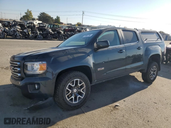 2017 GMC Canyon z VIN 1GTP6CE1XH1252005, wystawiony jako Copart lot #74982794 z przebiegiem 62 797 mil mil oraz Szkoda całkowita • Salvage title. Historia ofert i sprzedaży dostępna na DreamBid. Obrazek 1.