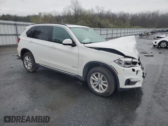 2014 BMW X5 xDrive35i with VIN 5UXKR0C50E0K42458, listed as a Copart auction lot 52069455 with 146,602 mi miles and Salvage Title. Bid and sale history available at carsss.com. Image 4.