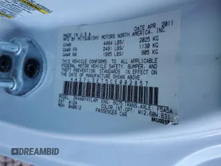 2012 Mitsubishi Eclipse GT with VIN 4A37L3ET5CE002857, listed as a Copart auction lot 48827535 with 97,772 mi miles and Salvage Title. Bid and sale history available at carsss.com. Image 14.