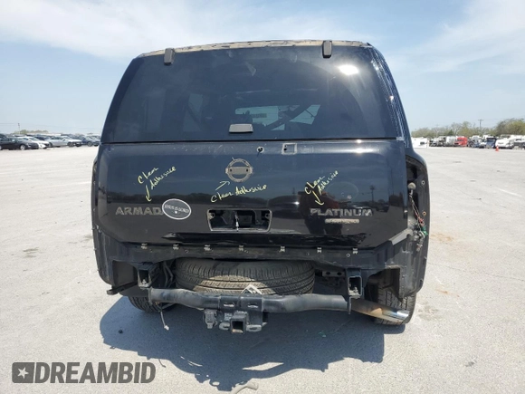 2014 Nissan Armada Platinum z VIN 5N1BA0NF8EN610981, wystawiony jako Copart lot #53144515 z przebiegiem 188 423 mil mil oraz Szkoda całkowita • Salvage title. Historia ofert i sprzedaży dostępna na DreamBid. Obrazek 6.