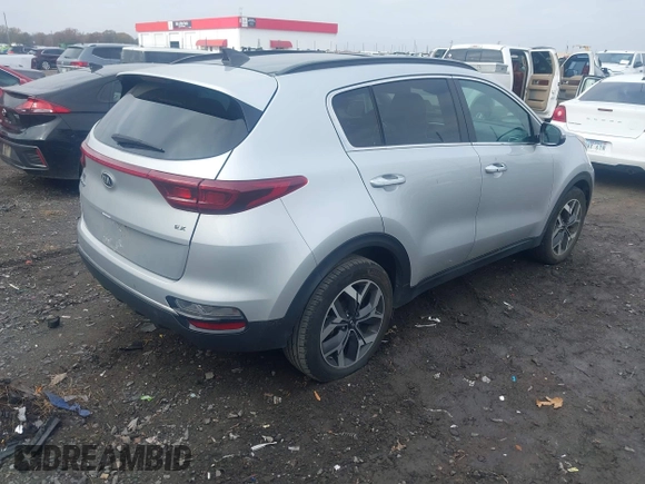 2020 Kia Sportage EX with VIN KNDPN3AC9L7775192, listed as a IAAI auction lot 41020011 with 60,652 mi miles and . Bid and sale history available at DreamBid. Image 4.