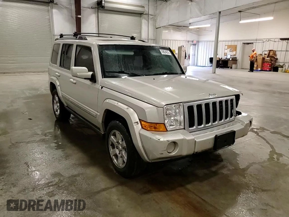 2007 Jeep Commander Overland z VIN 1J8HG68237C610869, wystawiony jako Copart lot #59824675 z przebiegiem 229 092 mil mil oraz Szkoda całkowita • Salvage title. Historia ofert i sprzedaży dostępna na DreamBid. Obrazek 14.