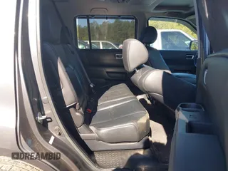 2013 Honda Pilot Touring with VIN 5FNYF3H92DB001308, listed as a IAAI auction lot 42007426 with 225,869 mi miles and . Bid and sale history available at DreamBid. Image 8.