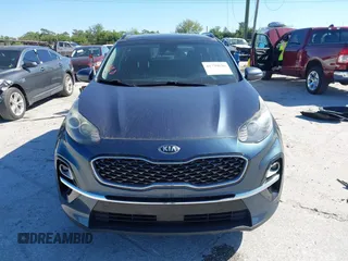 2020 Kia Sportage EX z VIN KNDPN3AC7L7781783, wystawiony jako IAAI lot #41739626 z przebiegiem 103 413 mil mil oraz . Historia ofert i sprzedaży dostępna na DreamBid. Obrazek 12.