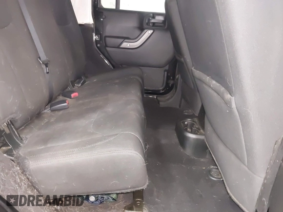 2017 Jeep Wrangler Unlimited Sport with VIN 1C4BJWDG6HL701149, listed as a IAAI auction lot 42678079 with 101,073 mi miles and . Bid and sale history available at DreamBid. Image 8.