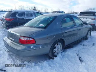 2004 Mercury Sable LS Premium with VIN 1MEFM55S04A619587, listed as a IAAI auction lot 41571950 with 125,444 mi miles and . Bid and sale history available at DreamBid. Image 4.