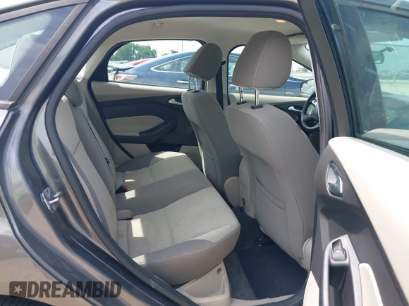 2013 Ford Focus SE z VIN 1FADP3F27DL267203, wystawiony jako IAAI lot #42470614 z przebiegiem 180 153 mil mil oraz . Historia ofert i sprzedaży dostępna na DreamBid. Obrazek 8.